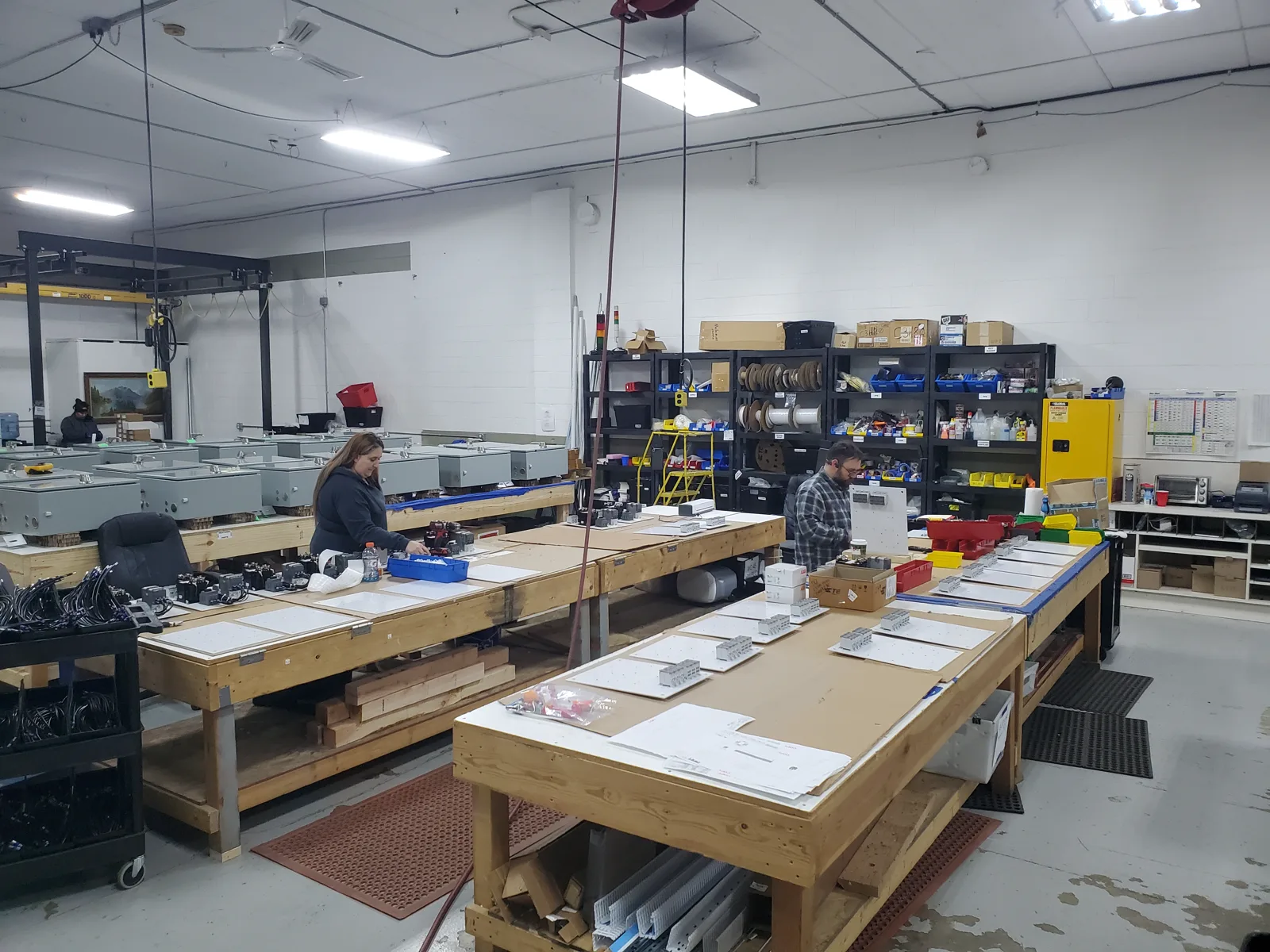 Our UL 508A panel shop in Brookfield, with technicians at the build benches